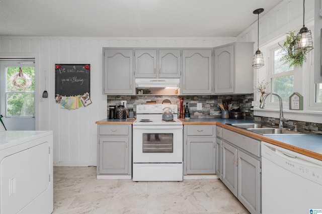 5242 Roy Dr, Helena, AL 35080 - kitchen with white appliances, washer / dryer, a sink, decorative backsplash, and gray cabinets