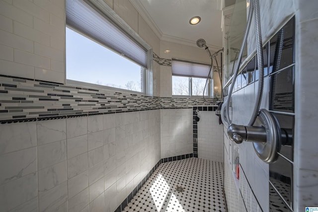 full bath with crown molding and tiled shower