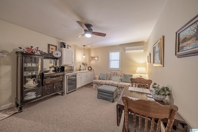 living room with an AC wall unit, a ceiling fan, wine cooler, bar area, and light colored carpet