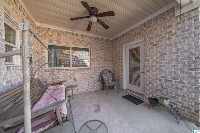 view of patio / terrace featuring ceiling fan