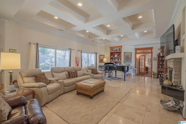 living area with beamed ceiling, coffered ceiling, crown molding, and a towering ceiling