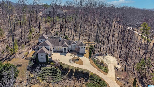 bird's eye view featuring a forest view