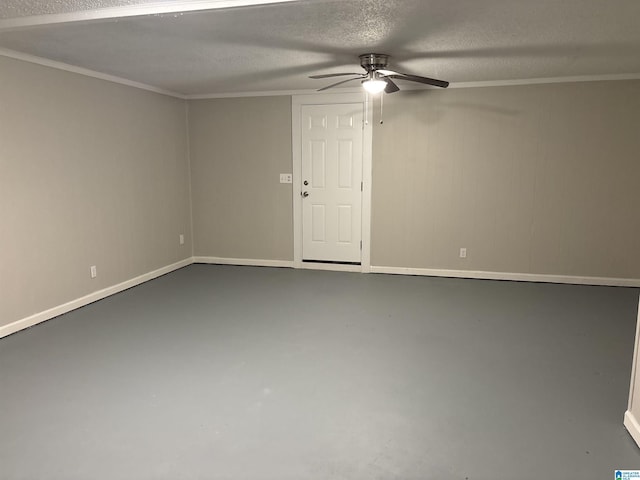 empty room featuring baseboards, a textured ceiling, concrete floors, and ceiling fan