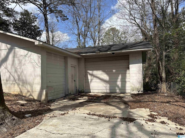 garage with driveway