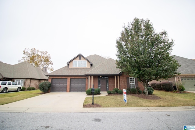 view of front of house featuring brick siding, a shingled roof, a front lawn, concrete driveway, and an attached garage