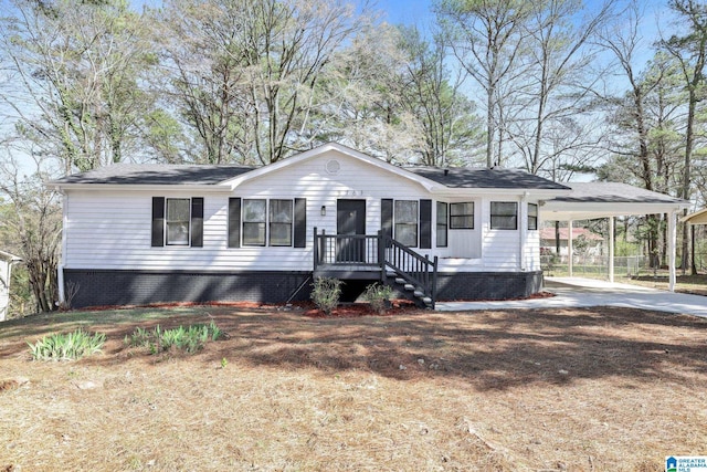 view of front facade featuring an attached carport