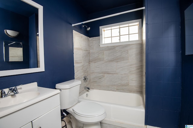 full bath with washtub / shower combination, toilet, and vanity