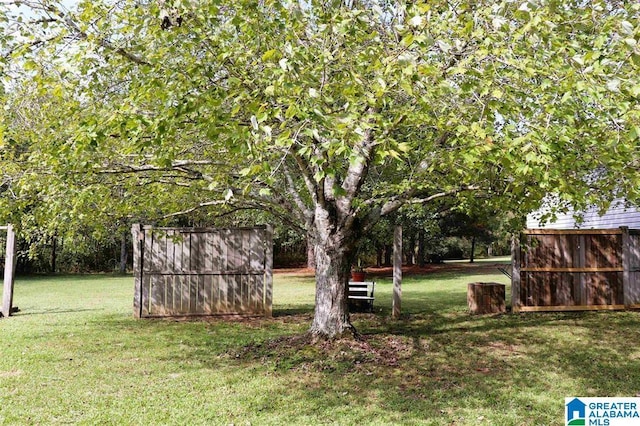 view of yard with fence