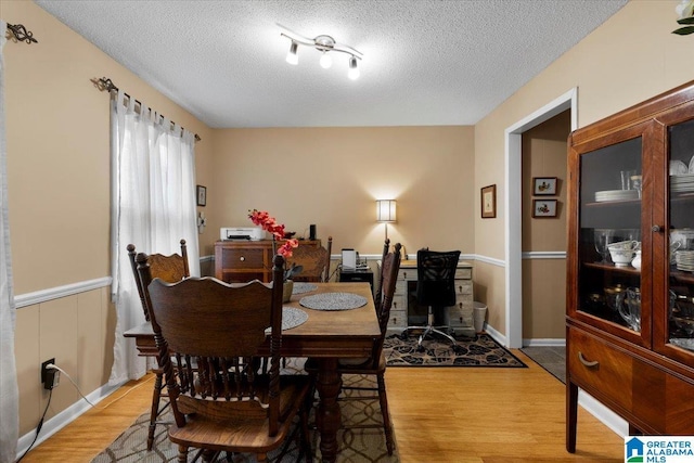 236 Oak Ridge Dr, Oneonta, AL 35121 - dining area featuring a textured ceiling and light wood-type flooring