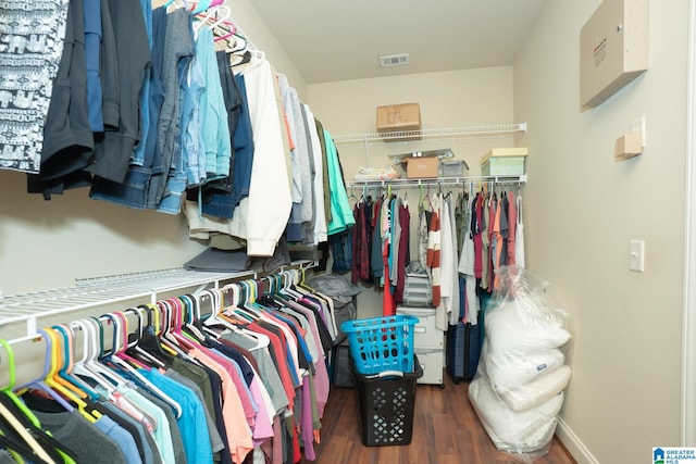 spacious closet with wood finished floors and visible vents