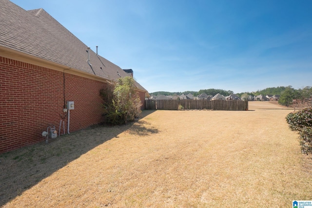 view of yard featuring fence