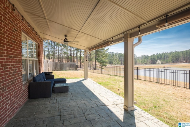 view of patio / terrace featuring ceiling fan and a fenced backyard