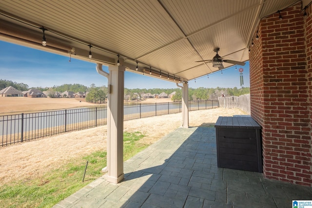 view of patio / terrace with a fenced backyard and ceiling fan