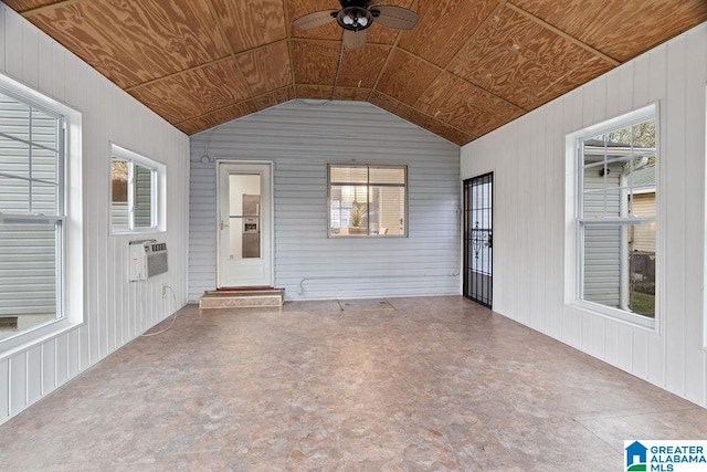 view of patio / terrace featuring a wall mounted air conditioner and ceiling fan