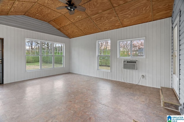 unfurnished living room featuring lofted ceiling, wooden ceiling, and ceiling fan