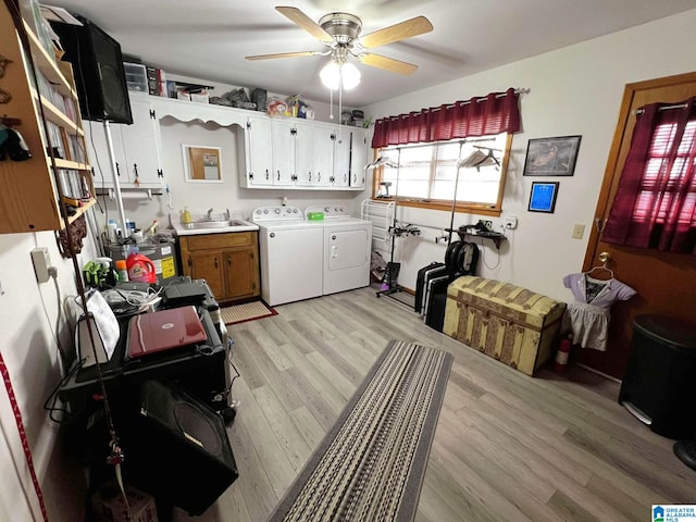 282 Stewart Rd, Cullman, AL 35055 - clothes washing area with a sink, light wood-style flooring, a ceiling fan, and washing machine and clothes dryer