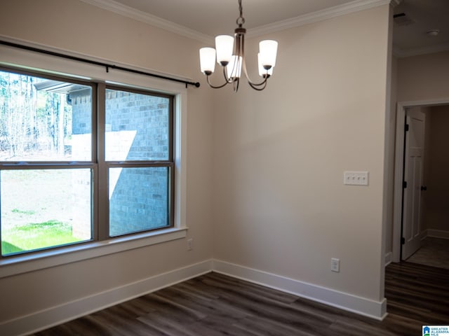 empty room featuring visible vents, dark wood finished floors, an inviting chandelier, crown molding, and baseboards