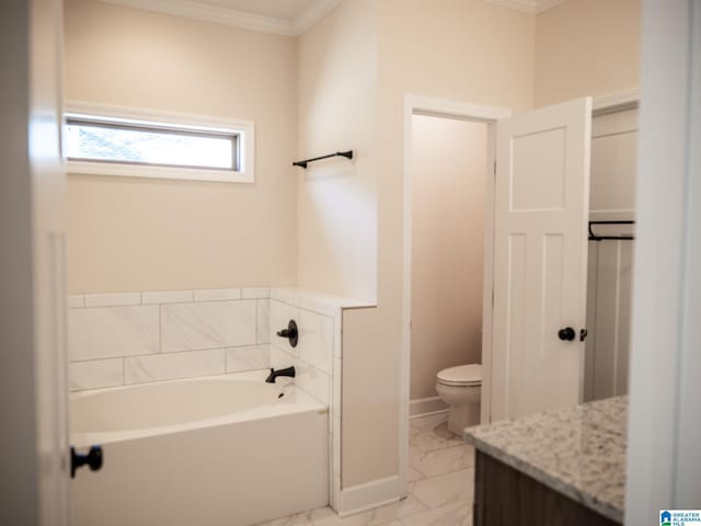 full bathroom with toilet, marble finish floor, a bath, and ornamental molding
