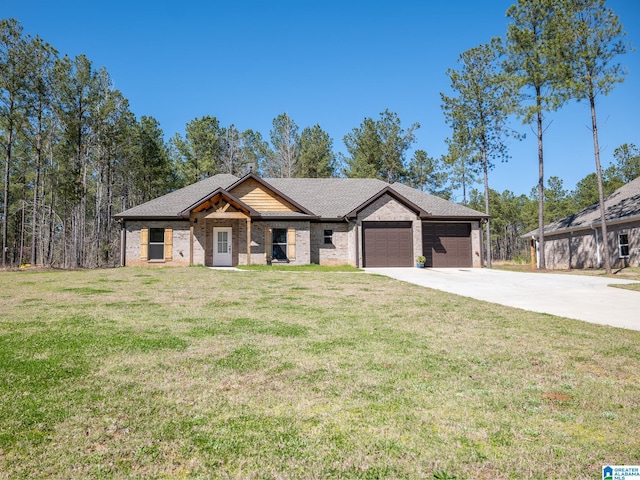 view of front of home featuring brick siding, an attached garage, concrete driveway, and a front yard
