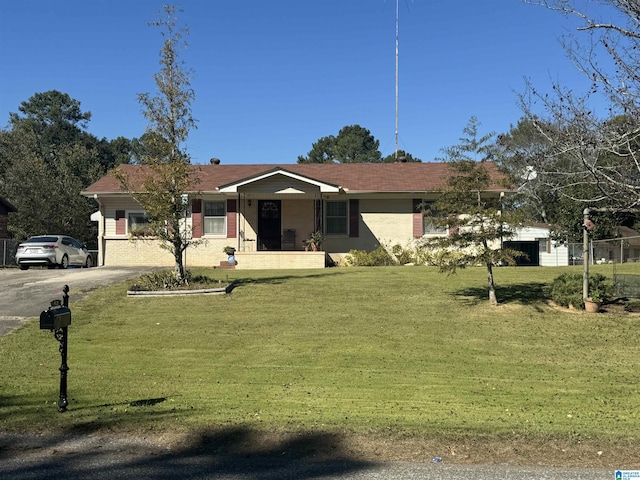 single story home with a front yard