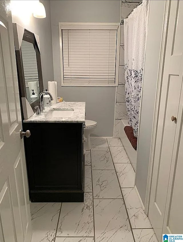 full bathroom with vanity, shower / bath combination with curtain, toilet, and marble finish floor