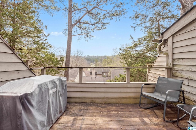 wooden deck featuring grilling area