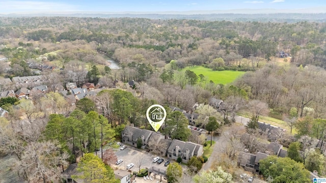 aerial view featuring a view of trees