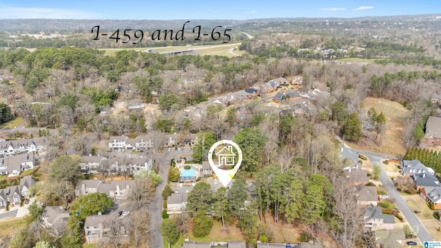 birds eye view of property with a residential view