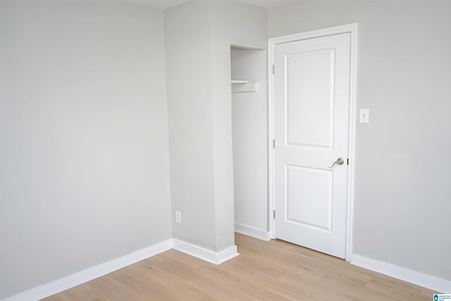 3459 35th Ave N, Birmingham, AL 35207 - unfurnished bedroom with light wood-type flooring and baseboards