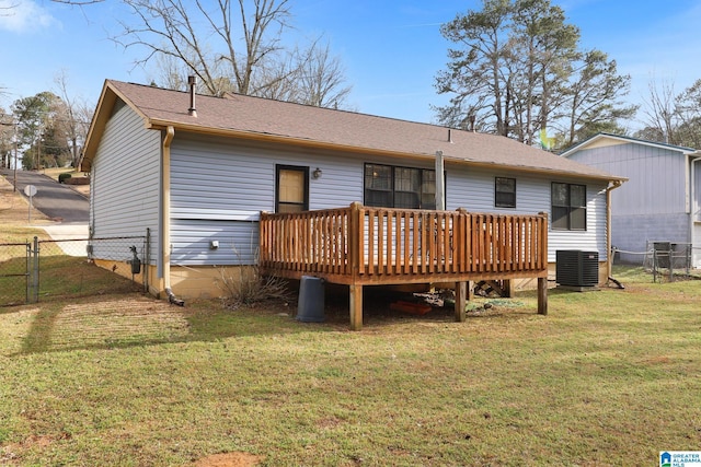 back of house with fence, central AC unit, a lawn, a deck, and a gate