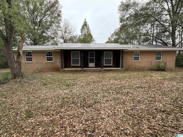 861 Lankford Ln, Alexandria, AL 36250 - view of front of property with brick siding, a porch, and metal roof