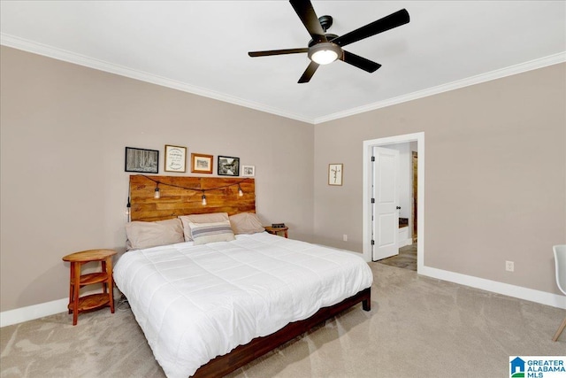 bedroom featuring baseboards, light colored carpet, ceiling fan, and crown molding