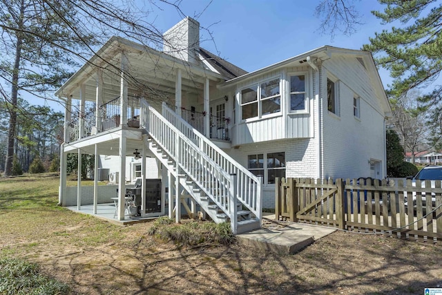 500 Liberty Rd, Chelsea, AL 35043 - back of house with stairs, a patio, fence, and a chimney
