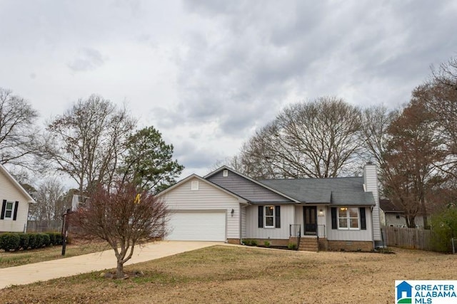 ranch-style home with board and batten siding, fence, concrete driveway, a chimney, and a garage