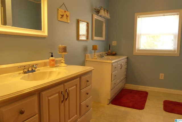 1310 County Road 264, Wedowee, AL 36278 - full bathroom featuring a sink, baseboards, two vanities, and tile patterned flooring