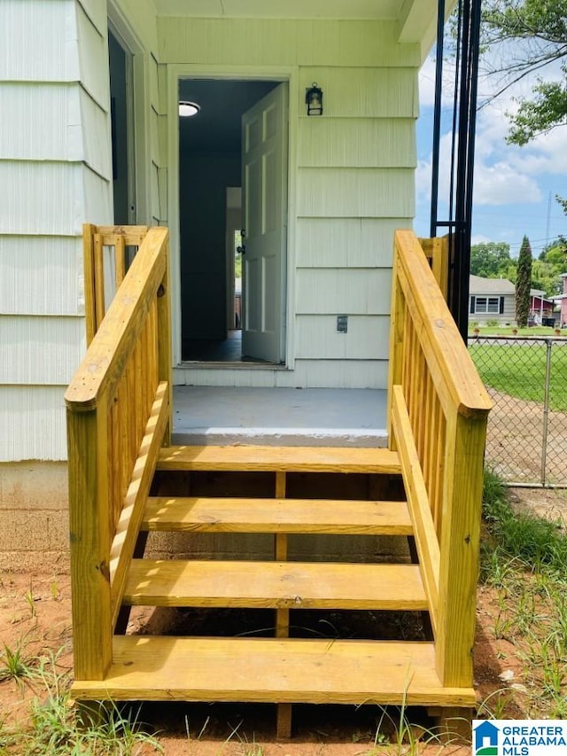 property entrance with fence