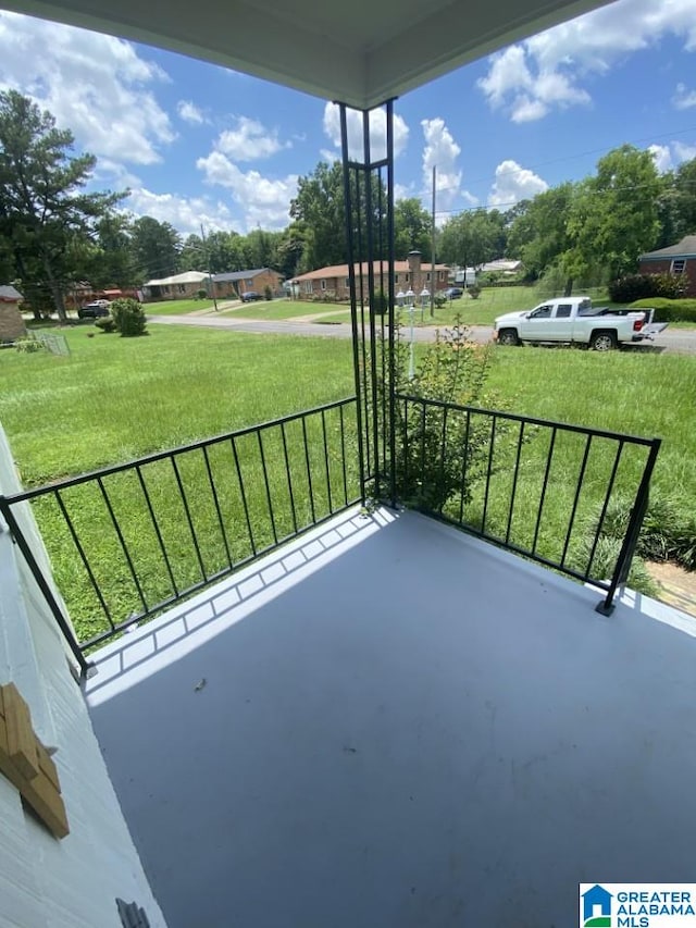 view of patio with a balcony