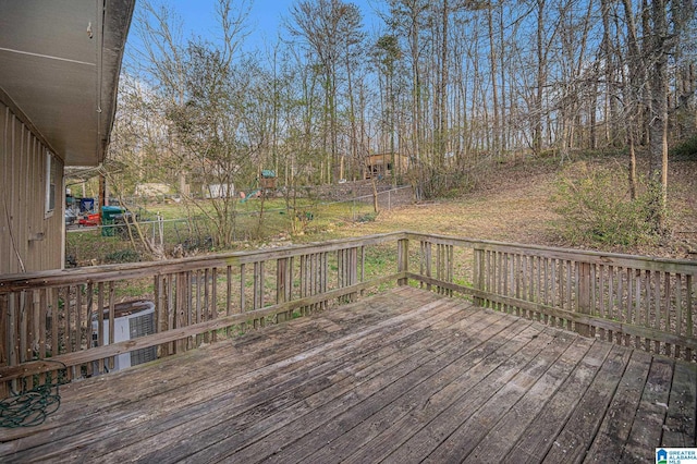 wooden deck featuring central AC and fence