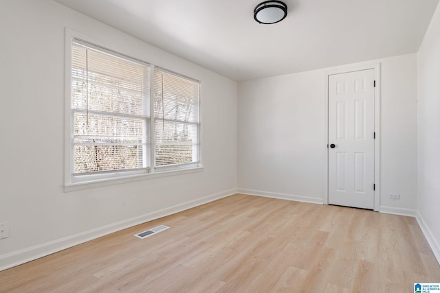 264 Mccalla Rd, Birmingham, AL 35022 - unfurnished room with visible vents, baseboards, and light wood-style floors
