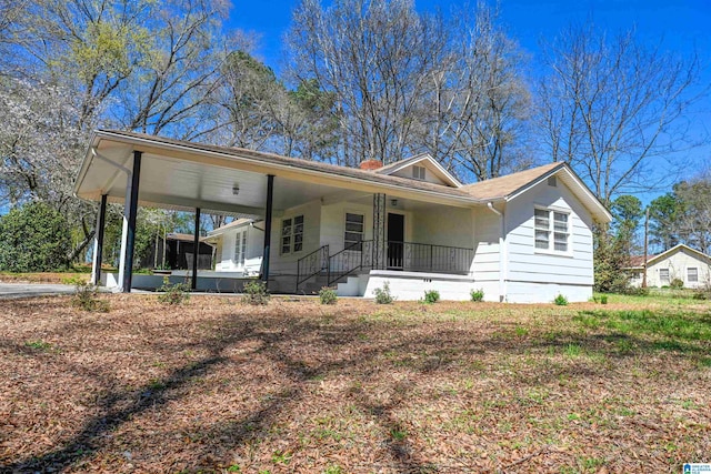 264 Mccalla Rd, Birmingham, AL 35022 - view of front of home featuring a porch and a chimney