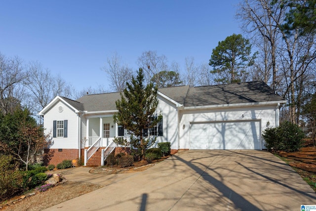 ranch-style house with concrete driveway and a garage