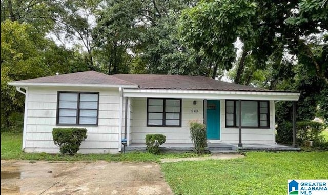 563 Brussels Ave, Birmingham, AL 35212 - single story home with a porch and a front yard