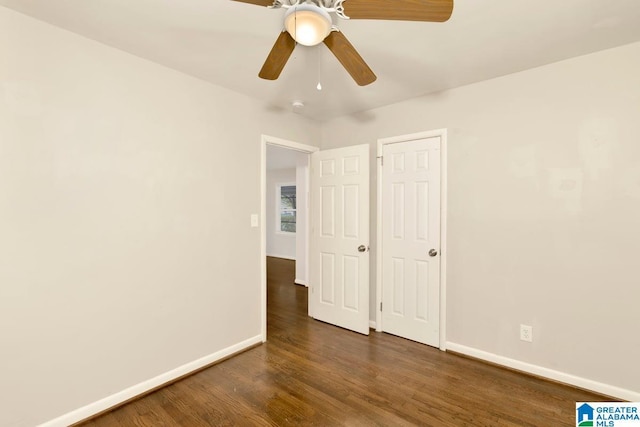 563 Brussels Ave, Birmingham, AL 35212 - interior space featuring wood finished floors, baseboards, and ceiling fan