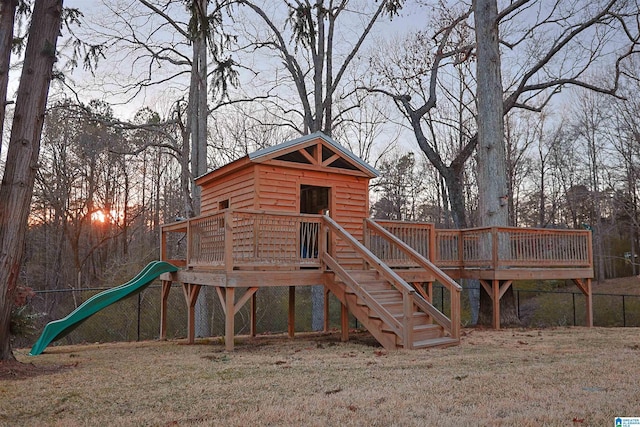 2365 Jim Raney Ln, Bessemer, AL 35023 - view of playground with fence, a deck, and stairs