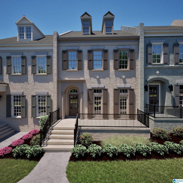 view of front of property with brick siding
