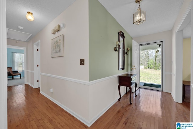 2350 Morton Rd, Warrior, AL 35180 - entrance foyer featuring baseboards, wood-type flooring, and a textured ceiling