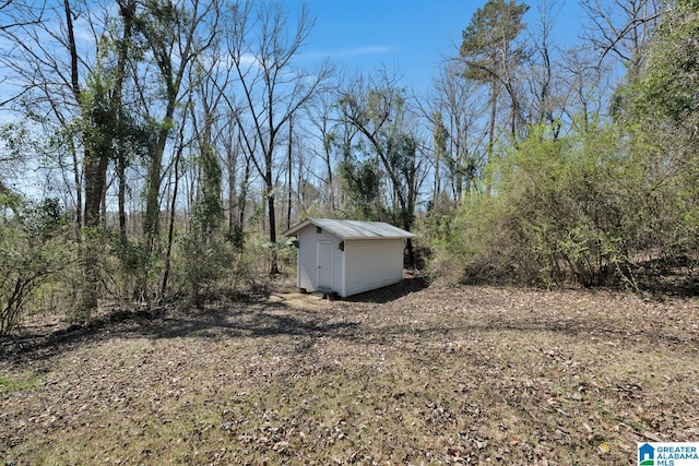 2350 Morton Rd, Warrior, AL 35180 - view of yard featuring a storage unit and an outdoor structure