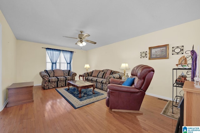 2350 Morton Rd, Warrior, AL 35180 - living area featuring ceiling fan, visible vents, baseboards, and hardwood / wood-style floors