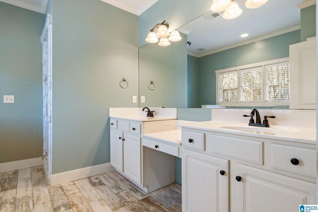 full bathroom with visible vents, crown molding, baseboards, double vanity, and a sink