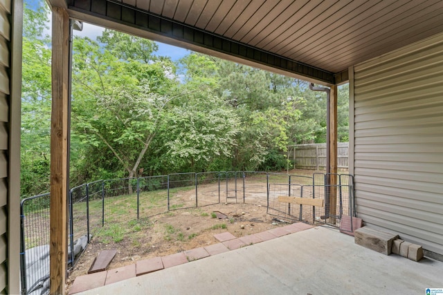 view of patio with a fenced backyard and a gate